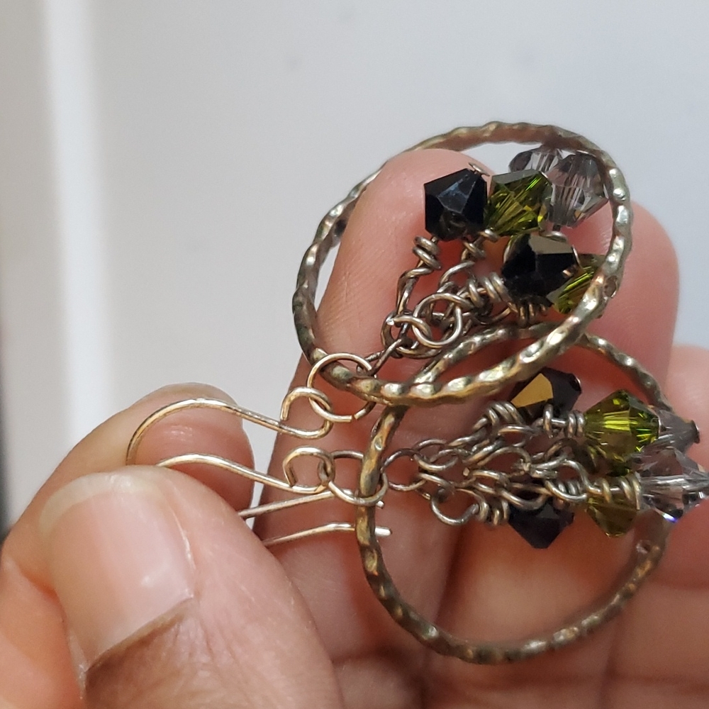 Glass silver earrings.